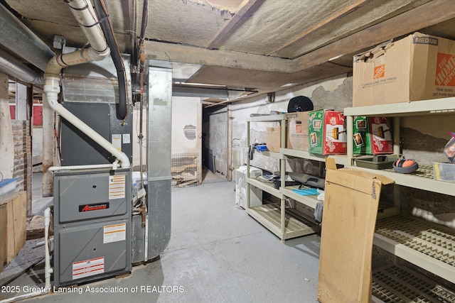 basement featuring heating unit