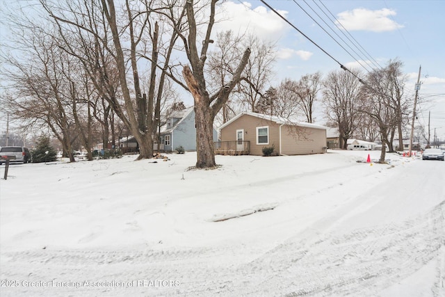 view of yard covered in snow