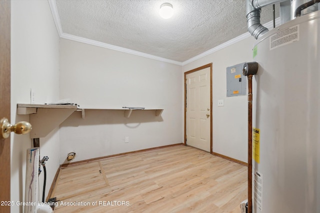 laundry room with gas water heater, ornamental molding, a textured ceiling, and light hardwood / wood-style flooring