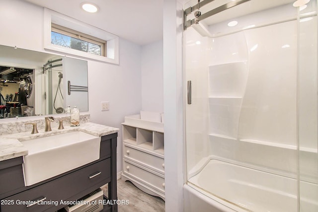 bathroom with vanity and tub / shower combination