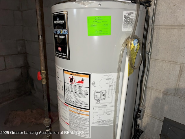 utility room featuring gas water heater