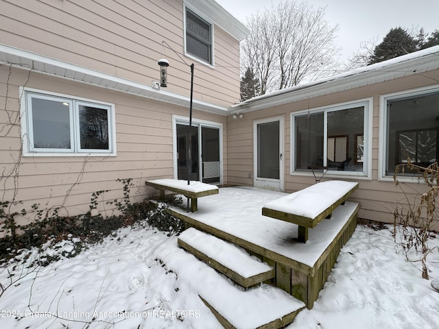 view of snow covered deck