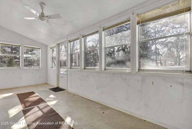 unfurnished sunroom with lofted ceiling and ceiling fan