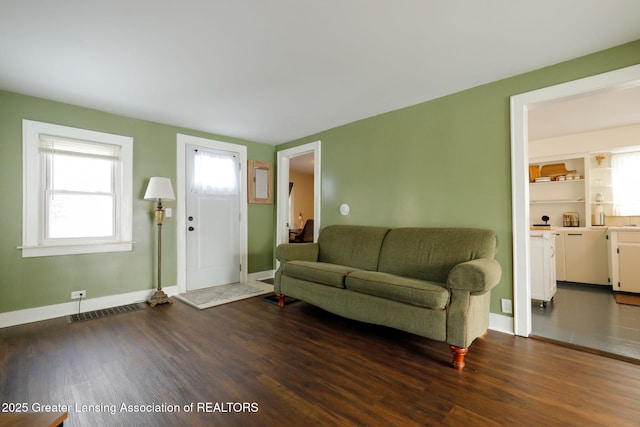 living room with dark wood-type flooring