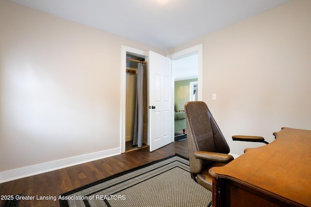 home office featuring dark hardwood / wood-style flooring