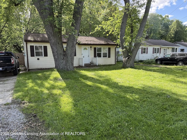 6444 Sommerset Rd, Lansing, MI 48911 - view of front of house featuring a front lawn