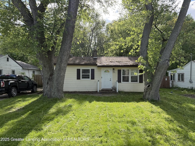6444 Sommerset Rd, Lansing, MI 48911 - view of front facade with a chimney and entry steps