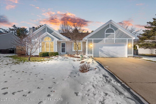 view of front of property with a garage