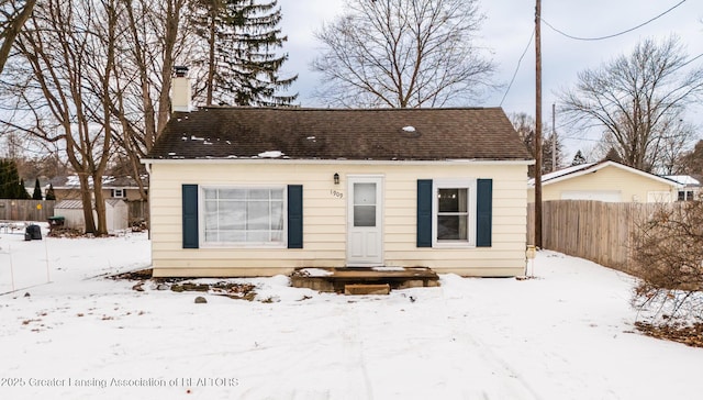 view of snow covered property