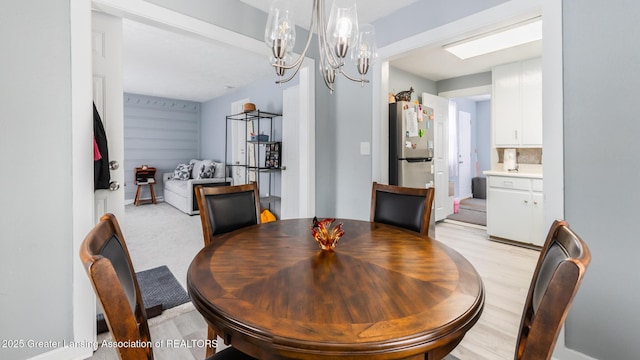 dining area with a chandelier