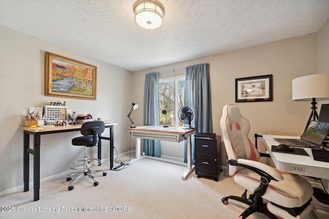 carpeted home office with a textured ceiling