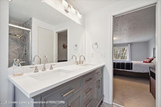 bathroom with vanity and a textured ceiling