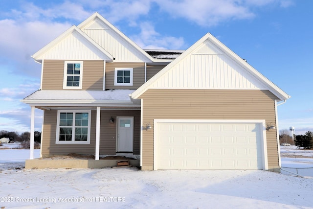 view of front facade with board and batten siding and an attached garage