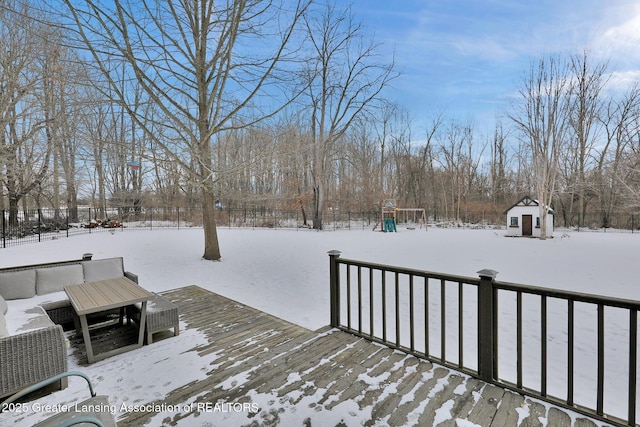 view of snow covered deck