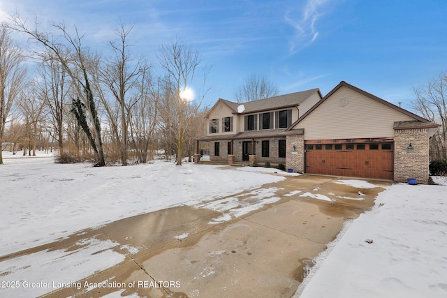 view of front of property with a garage