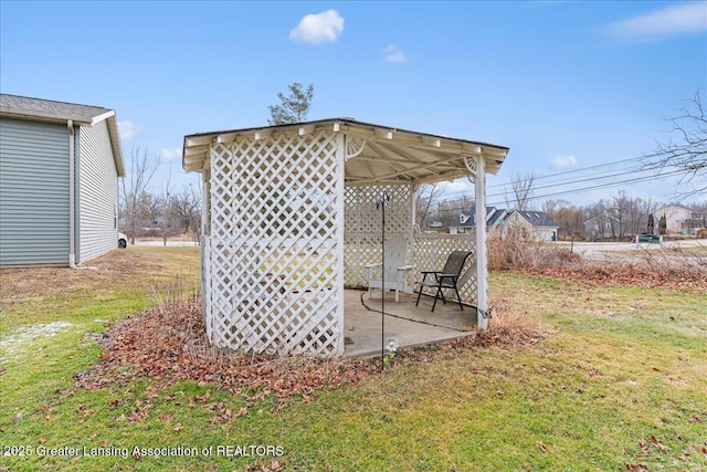 view of yard featuring a gazebo and a patio