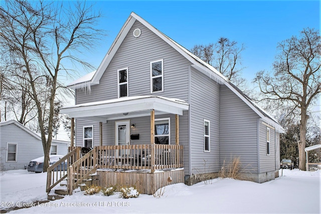 view of front of property featuring covered porch