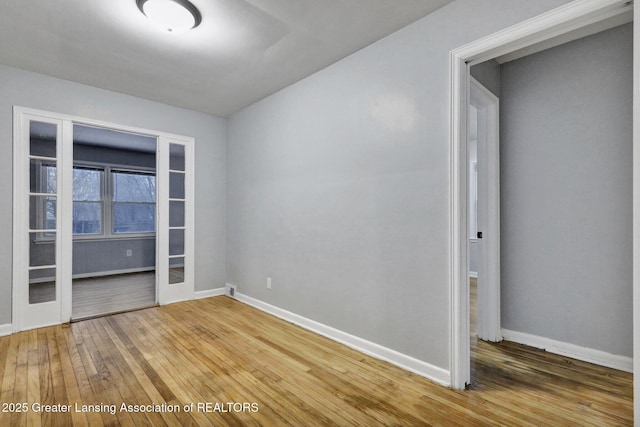 empty room featuring hardwood / wood-style floors