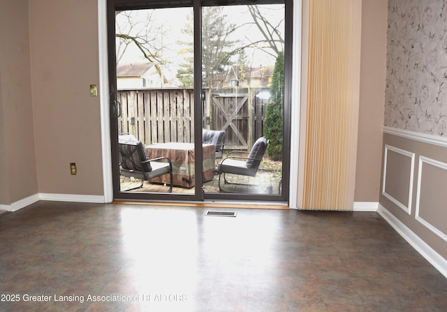 spare room with a wealth of natural light