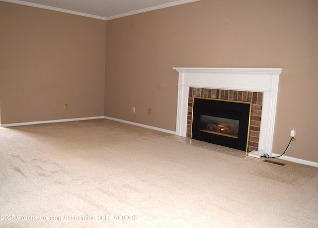 unfurnished living room featuring carpet, crown molding, and a fireplace