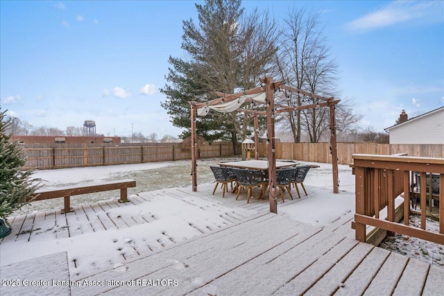 view of snow covered deck