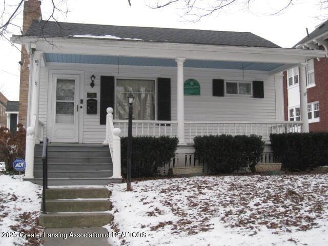 bungalow-style home featuring covered porch