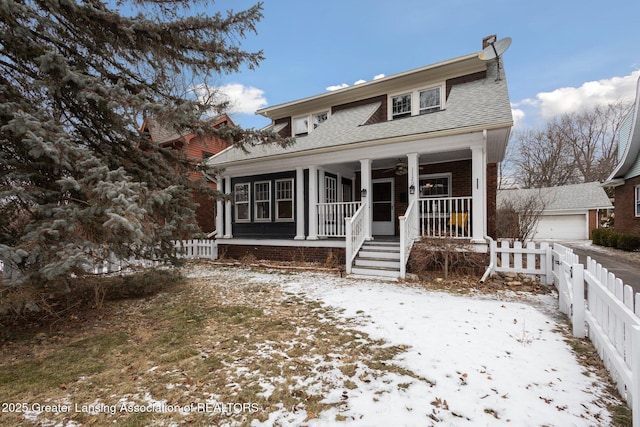 view of front of home with a porch and a garage