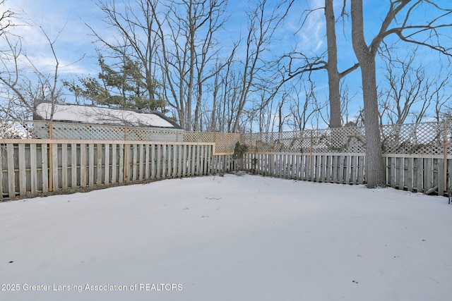 view of yard covered in snow