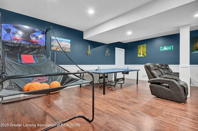 game room with hardwood / wood-style flooring