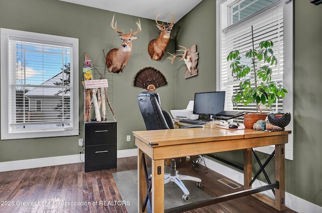 office space featuring dark hardwood / wood-style flooring