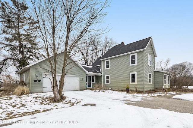 view of front of property featuring a garage