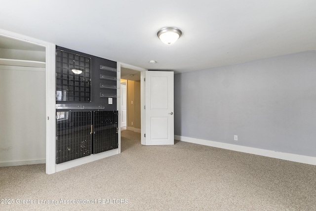 unfurnished bedroom featuring a closet and carpet floors