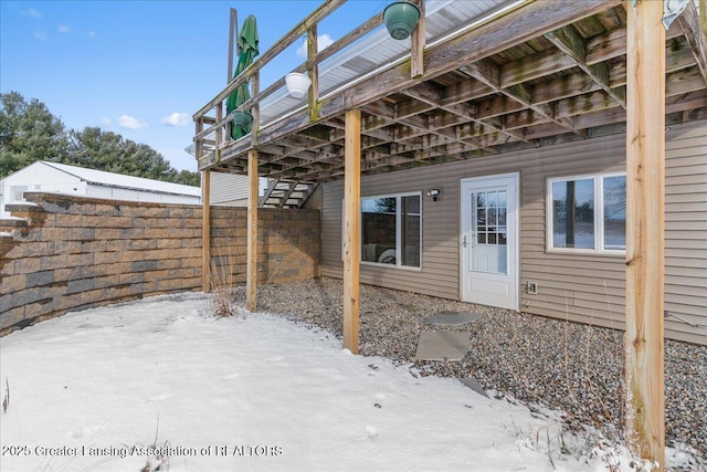 view of snow covered patio