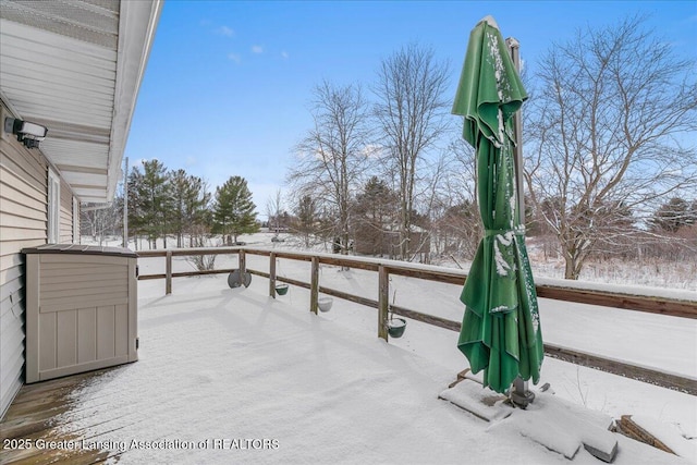 view of snow covered patio