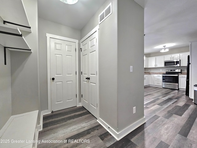 interior space featuring dark hardwood / wood-style flooring