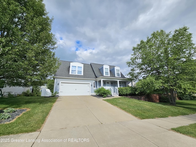 new england style home with a front yard and a porch