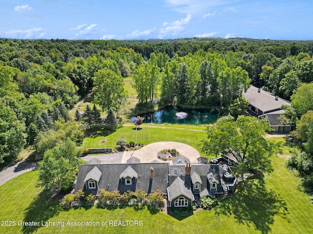 drone / aerial view with a water view