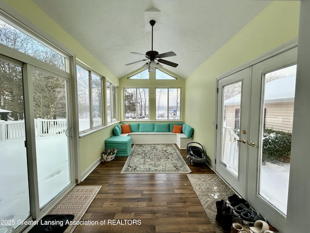 sunroom with lofted ceiling and french doors