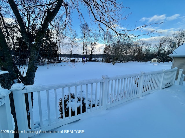 view of yard covered in snow