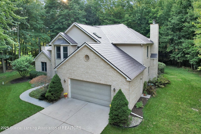 view of front of home featuring a garage and a front lawn