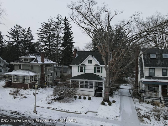 view of snow covered property