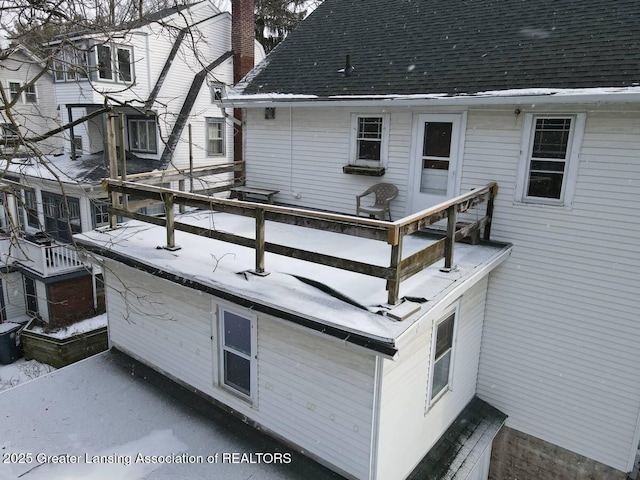 view of snow covered deck