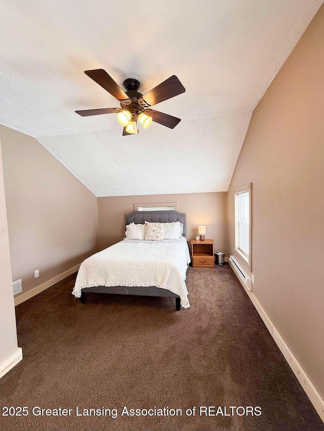 carpeted bedroom featuring a baseboard radiator, vaulted ceiling, a textured ceiling, and ceiling fan