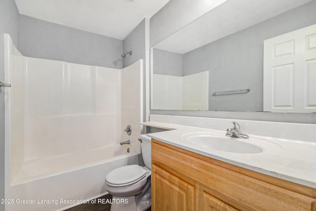 full bathroom with toilet, bathing tub / shower combination, and vanity