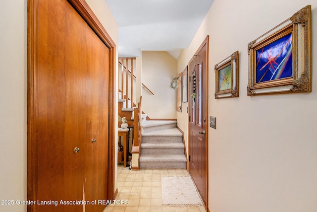 corridor featuring lofted ceiling