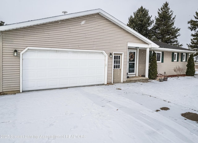 single story home featuring a garage