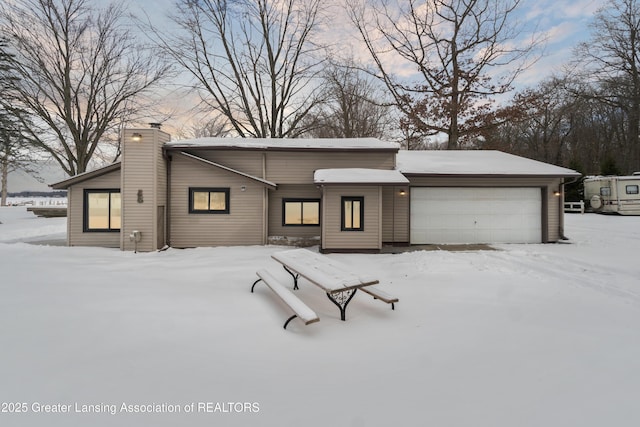 exterior space with a garage