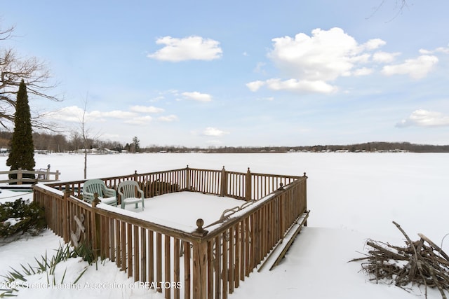 view of snow covered deck