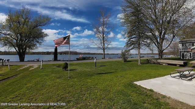 view of yard with a water view