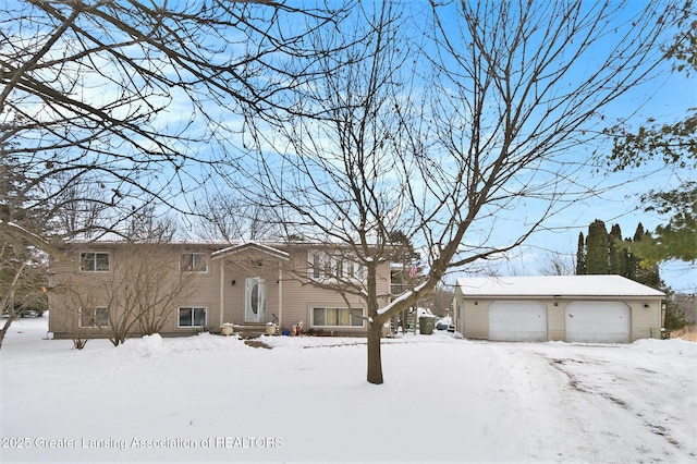 split foyer home with a detached garage